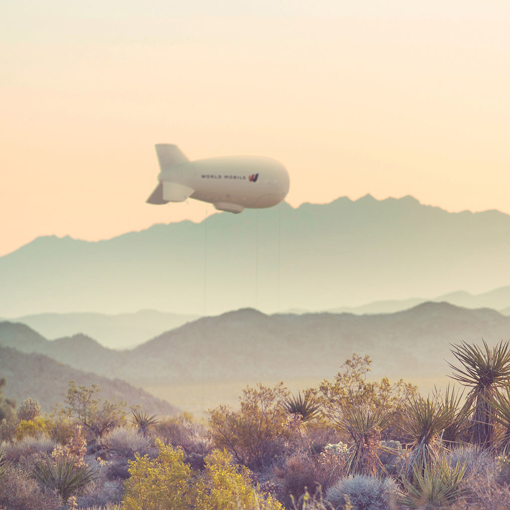 World Mobile Aerostat 4K Desert Wallpaper